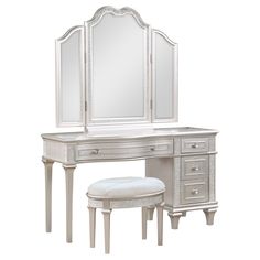 a white dressing table with mirror and stool