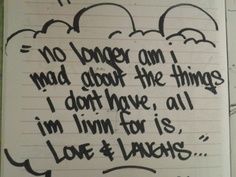 a notebook with writing on it that says no longer am i mad about the things i don't have, all i love for is love & laughs