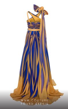 a blue and yellow dress on display in front of a white background