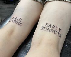 two people with tattoos that say late dawns and early sunsets on their legs