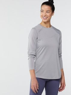 Comfy as you warm up  comfy as you cool down  even comfy when you break a sweat-the women's REI Co-op lightweight long-sleeve base layer top is ideal for skiing  hiking and lunch break  too. Heather Grey Athleisure Activewear, Relaxed Fit, Casual Long Sleeve Activewear For Light Exercise, Comfortable Long Sleeve Relaxed Fit Activewear, Comfortable Relaxed Fit Long Sleeve Activewear, Comfortable Sports Tops For Fall, Heather Grey Relaxed Fit Athleisure Activewear, Heather Grey Relaxed Fit Activewear, Gray Crew Neck Activewear For Light Exercise, Functional Long Sleeve Tops For Loungewear