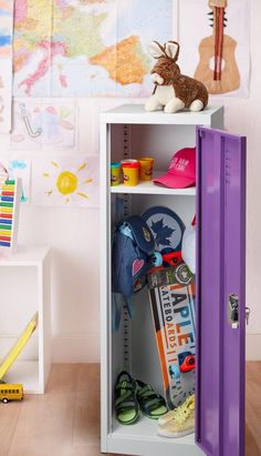 a purple locker with toys and other items in it