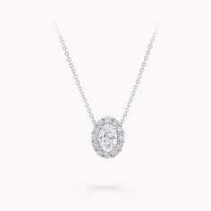 Our Icon oval diamond pendant in white gold is designed to make a delicately scintillating statement upon the décolletage. The centre stone is framed by a radiant halo of pavé diamonds, attracting and reflecting the light for a captivating display of brilliance. Named after the famous Icon diamond – a 90.97 carat D Flawless round brilliant diamond that was cut and polished by Graff in 2000 – the Icon collection celebrates the incomparable beauty of one of Mother’s Nature’s most precious gifts. M Oval Diamond Pendant, Diamond Shaped Engagement Ring, Radiant Halo, Icon Jewelry, Graff Diamonds, Round Diamond Pendant, Round Diamond Earrings, Diamond Earrings Studs Round, Engagement Ring Shapes