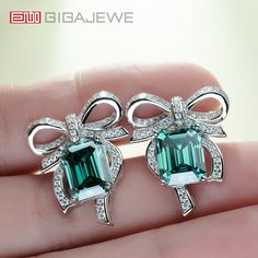 Brand:GIGAJEWE® Product Name:GIGAJEWE 8*10MM Total 10ct Emerald cut9K/14K/18k White Gold Earrings set with  Mossanite  white gold Push back earrings  wedding earrings Main Stone Material:Moissainte Stone  Shape:emerald shape Color: green color Stone Weight:8*10mm 4.0ct Customization: Can select different kinds of gemstone for customization Moissanite Gemstone Earrings For Gift, Gift Moissanite Gemstone Earrings, Elegant Emerald Earrings As A Gift, Elegant Emerald Earrings Gift, Silver Emerald Cut Moissanite Earrings, Sterling Silver Emerald Cut Wedding Earrings, Wedding Sterling Silver Emerald Cut Earrings, Emerald Cut Sterling Silver Earrings For Wedding, White Gold Earrings With May Birthstone