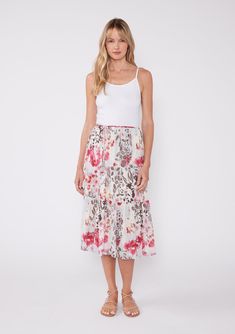 The ultimate versatile set for spring. Our feminine top and skirt set includes a cropped camisole and mid-length skirt, designed in a dreamy watercolor floral print. Try them styled together or apart! Two-piece set Floral print Relaxed fit Cropped camisole Adjustable spaghetti straps Ruffled neckline Mid-length skirt Adjustable waist tie Tiered hemline Model is 5'9, wearing a size S.Style: I-90002WL-PQS-CD Floral Printed Skirt, Dreamy Watercolor, Cropped Camisole, Watercolor Floral Print, Top And Skirt Set, Feminine Top, Ruffled Neckline, Printed Skirt, Floral Print Skirt