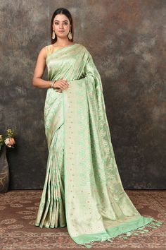 Buy pastel green Banarsi sari online in USA with zari minakari jaal. Look royal at weddings and festive occasions in exquisite Banarasi saris, handwoven sarees, tussar silk sarees, Bollywood sarees, partywear sarees from Pure Elegance Indian saree store in USA.-full view Pista Green Katan Silk Traditional Wear With Meenakari, Green Paithani Silk Saree With Resham Embroidery, Green Paithani Silk Dupatta With Resham Embroidery, Pista Green Saree With Meenakari In Traditional Drape, Green Saree With Meenakari In Traditional Drape, Green Dola Silk Saree With Meenakari Work, Pista Green Art Silk Saree With Meenakari, Green Jamawar Saree With Zari Work, Pista Green Meenakari Saree With Traditional Drape