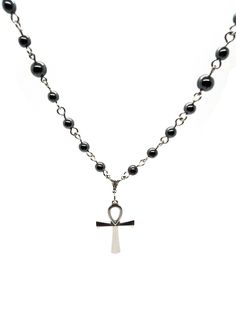 Made to Order! An enduring staple of the goth subculture, this ankh necklace is a goth jewelry cornerstone for your wardrobe. The chain construction is kept simple to allow the pendant to shine. This ankh is made of stainless steel and will not tarnish over time. The sturdy construction and simple beauty of this necklace make a reliable piece that you won't want to leave home without. The shiny steel will contrast perfectly with all manner of gothic attire. At your favorite club, you can dance a Black Ankh Metal Jewelry, Gothic Ankh Necklace In Metal, Gothic Ankh Metal Necklace, Silver Ankh Gothic Necklace, Ankh Shaped Black Metal Necklace, Black Ankh Necklace In Metal, Emo Necklace, Gothic Attire, Accessories Png