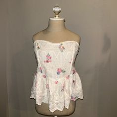 Never Worn Size Large Top With Adorable Embroidery And Floral Details! Has Straps For Easy Hanging White Strapless Top For Spring, Bohemian Lace Top With Floral Print, Lace Tops With Floral Print For Beach, Lace Floral Print Tops For Beach, Beach Lace Tops With Floral Print, White Embroidered Lace Top For Spring, White Lace Embroidered Top For Spring, Feminine Embroidered White Tops, White Lace Embroidered Top With Floral Design