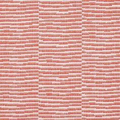 an orange and white wallpaper pattern with small squares on the bottom half of it