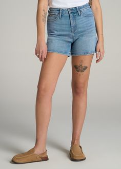 High Rise Denim Shorts for the Tall Fashionista Your Newest Summer Essential Get ready to make a statement this summer with our High Rise Denim Shorts, our latest women's shorts in tall sizes. These shorts offer a flattering high-waist design and a thigh-length cut that perfectly balances comfort and style. With a versatile look that can be dressed up or down, these tall women's shorts are a must-have for your warm-weather wardrobe.• High-waisted design for a flattering silhouette• Thigh-length Light Wash Mid-rise Bottoms With Built-in Shorts, Denim Blue Bottoms With Built-in Shorts, Medium Wash Short Leg Denim Bottoms, Mid-rise Medium Wash Cotton Shorts, Medium Wash High Waist Cotton Shorts, Mid-rise Light Wash Jean Shorts, Medium Wash Mid-rise Cotton Jean Shorts, Mid-rise Medium Wash Cotton Jean Shorts, High Rise Light Wash Jean Shorts With Built-in Shorts