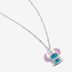 a pink and blue necklace with an elephant on the front is hanging from a silver chain