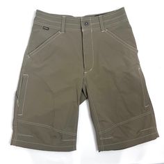 Kuhl Renegade Cargo Shorts Keep All The Style Of Casual Clothes But Get All The Function Of High-Performance Hiking Apparel. Zip Fly, Front Hand Pockets, A Side Cell Phone Pocket And 2 Rear Hook-And-Loop Pockets, Upf 50+, 88% Nylon Blend Smooth Finish Size 30 Approx 14” Flat Across Waist, 11.75” Long Inseam 10.5” Rise Like New Hiking Casual Active Khaki Green Gray Brown Normcore Gorpcore Slow Fashion Techwear Khaki Shorts For Outdoor Activities, Khaki Outdoor Pants With Built-in Shorts, Khaki Bermuda Bottoms For Outdoor, Khaki Outdoor Shorts, Khaki Short Pants For Outdoor Activities, Khaki Short Length Bottoms For Outdoor Activities, Green Short Outdoor Pants, Green Outdoor Short Pants, Bermuda Bottoms With Built-in Shorts For Outdoor