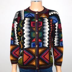 Luxurious 100% Baby Alpaca Knitted By Hand Multi-Color Geo Pattern Cardigan. No Size Tag, Measures To Fit A Women's Size Small. Excellent Condition! Features Incredible Intricate Pattern, Painted Buttons, Made In Peru, Very Soft, Very Beautiful. You Will Love It! Length - 21" Bust - 19" Waist - 18" Shoulder Seam - 19" Sleeve - 17" Measurements Taken With The Garment Laying Flat, And Are Approximate. Please Check Before Ordering To Ensure The Perfect Fit Black Jacquard Knit Cardigan, Black Fair Isle Pattern Cardigan For Fall, Black Casual Cardigan With Fair Isle Pattern, Casual Black Cardigan With Fair Isle Pattern, Black Fair Isle Cardigan For Fall, Multicolor Wool Long Sleeve Cardigan, Wool Jacquard Knit Crew Neck Cardigan, Multicolor Jacquard Knit Winter Cardigan, Winter Multicolor Jacquard Knit Cardigan