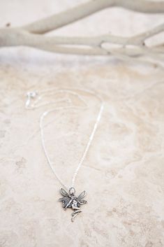 Delicate Silver Plated Fairy Charmed Necklace – Ornata Fairy Charm Necklace, Charmed Necklace, Sterling Silver Dragonfly Necklace, Short Silver Necklace, Shell Charm Necklace, Silver Dragonfly Necklace, Sand Dollar Necklace, Cross Charm Necklace, Fairy Charms