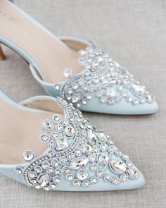 Shop our women shoes collection in glitter, satin and lace. Comfortable wear for bridal party, formal wear, night out and weddings. FREE SHIPPING IN U.S FOR ORDERS $100 AND MORE! Silver Heels With Rhinestones For Reception, Bedazzled High Heel Wedding Heels, Bedazzled High Heels For Wedding, Low Heel Rhinestone Wedding Shoes For Evening, Low Heel Wedding Shoes With Rhinestones For Evening, Embellished Heels For Reception, Elegant Embellished Heels For Wedding, Crystal High Heels For Wedding, Glamorous Rhinestone Wedding Shoes For Reception