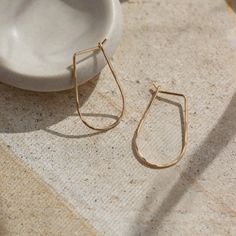 solid gold athena hoops, solid gold hoops, hand hammered solid gold, handmade jewelry, made in the USA, made in wisconsin, woman owned business, classic hoops, classic gold hoops, effortless jewelry, timeless gold jewelry Minimalist 14k Gold Teardrop Huggie Earrings, Gold 14k Hoop Earrings For Everyday, 14k Gold Hoop Earrings For Daily Wear, 14k Gold Hoop Earrings For Everyday Elegance, Gold Sterling Silver Hoop Earrings For Everyday Elegance, Everyday Yellow Gold Teardrop Hoop Earrings, Yellow Gold Teardrop Hoop Earrings For Everyday, Gold-toned Sterling Silver Hoop Earrings For Everyday Elegance, Minimalist Teardrop Tarnish-resistant Hoop Earrings