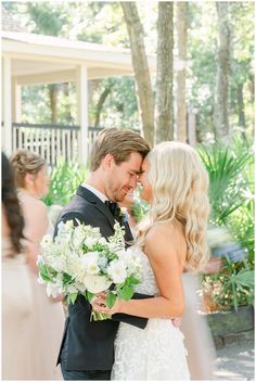 a bride and groom sharing a kiss at their wedding