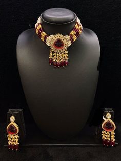 A symbol of feminism and elegance. Prepare yourself for the festive season with this gorgeous Choker set with Earrings. Gold Sets For Festival Celebrations, Gold Sets For Celebration And Festival, Gold Party Sets For Festival, Traditional Meenakari Sets For Party, Traditional Beaded Party Sets, Traditional Beaded Sets For Festive Season, Traditional Festive Beaded Sets, Elegant Beaded Sets For Festive Occasions, Elegant Beaded Sets For Festive Season