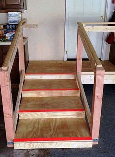 the steps are made out of plywood and have red tape on them