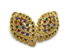 "Vintage gold-tone multi-color rhinestone enamel filigree diamond shape earrings. Gold-tone filigree colorful earrings with rhinestones and black enamel around the edges. Great pair of vintage earrings in great shape.   Measurements 1 1/2\" x 1\"." Vintage Jeweled Multicolor Earrings, Vintage Multicolor Jeweled Earrings, Multicolor Jeweled Costume Jewelry Earrings, Gold Rhinestone Earrings For Festive Occasions, Festive Gold Rhinestone Earrings, Festive Gold Earrings With Rhinestones, Diamond Shape Earrings, Colorful Earrings, Diamond Shape