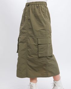 Cargo Skirt With Side Pocket Detail And Rear Slit 100% NYLON MODEL IS 5' 7" TALL, 32" CHEST, 25" WAIST, 35" HIPS AND WEARING A SIZE SMALL IMPORTED. DESIGNED IN THE USA ZIMEGO APPAREL USA BY DOUBLEZERO-BOTTOM United Parcel Service, Short Sleeve Hoodie, Cargo Skirt, Bag Dress, Edgy Outfits, Long Hoodie, Summer Essentials, Pocket Detail, Sleeveless Tank