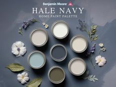 six paint cans with flowers and leaves around them on a gray background that says, hale navy home paint palette