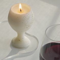 Hand poured with natural soy wax, wine candle is a must‑have room essential for wine lovers. With a sleek design inspired by a wine glass, our wine candle adds a touch of elegance to any setting. Whether you’re hosting a dinner party or simply relaxing at home, this candle creates a warm and sophisticated ambiance! 2.0 x 3.0 inch