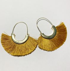 Super chic and fun silk thread fringe tassel earrings.  The matte vintage color gold earrings come in a blush/beige color and also a vibrant marigold color. These are the statement earrings for the fall 2020 season - they are a soft silk fringe so they are lightweight and comfortable to wear with any outfit. Gold Earrings With Latkans For Summer, Trendy Gold Tassel Earrings For Summer, Trendy Fringe Earrings As A Gift, Chic Tassel Earrings For Summer, Gold Tassel Earrings For Spring Gift, Elegant Summer Jewelry With Tassels, Trendy Spring Jewelry With Tassels, Gold Fringe Earrings For Summer, Elegant Tassel Earrings For Spring