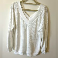 Nwot White Sweater. Wide V-Neck In Front And Back Can Be Worn Off One Or Both Shoulders. See Through Knit Material Can Be Worn With Bralette Or Tank Top. Never Worn, Size Large. Chic White V-neck Sweater For Spring, White Stretch V-neck Sweater For Spring, White Waffle Knit Tops For Spring, Spring White Waffle Knit Tops, White Winter Tops For Brunch, White Winter Top For Brunch, White Waffle Knit Top For Fall, Casual White Sweater For Brunch, Off Shoulder Sweater