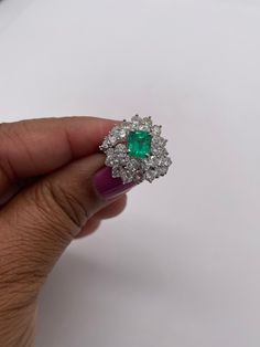 Stunningly gorgeous, Emerald & Diamond Ring set in Platinum. Handmade. Beautiful quality piece of jewelry. Approximately 2.20 ct. in Diamonds, Emerald is nice color & measures 1.15 ct. Diameter of ring is 19mm, size 6 but can be sized. Circa 1950's Luxury Gia Certified Diamond Gemstones, Luxury Gia Certified Emerald Gemstones, Luxury Emerald Gemstones With Prong Setting, Elegant Green Diamond Gemstones, Elegant Brilliant Cut Emerald Gemstones, Elegant Emerald Gemstones With Center Stone, Emerald Cut Diamond Fine Jewelry, Gia Certified Elegant Emerald Gemstones, Elegant Gia Certified Emerald Gemstones