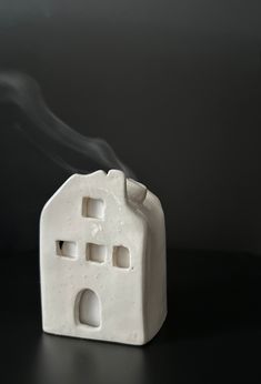 Brighten your cozy space with this handmade ceramic cottage incense burner! Watch as smoke gracefully drifts out of the chimney to make your home feel inviting and magical. A unique way to set the mood! Clay Incense Burner, Ceramic Cottage, Clay Incense, Set The Mood, Sculpey Clay, Pottery Crafts, Holiday Time, Cozy Space, Incense Burner