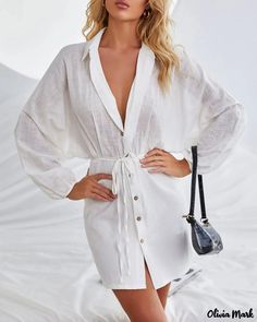 Olivia Mark - Ruched Long Sleeve Tie Front Button Shirt Dress Solid Button-up Shirt Dress For Vacation, Solid Color Beach Shirt Dress With Button Closure, Beach Shirt Dress With Button Closure, Chic Button-up Shirt Dress For Vacation, Chic Beach Shirt Dress With Button Closure, Summer Shirt Dress With Long Sleeves And Buttons, Button-up Shirt Dress For Vacation, V-neck Shirt Dress With Button Closure For Beach, Fall Beach Shirt Dress With Buttons