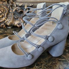 * Size 6.5m * Heel Hight: 2.75" * Color: Classic Grey * Stylish: Unique Design * Brand New * Zipper Opening At Back * 5 Buttons (Operable) * Easy To Wear Open Front & Back * None Negotiable Price Spring Lace-up Heels For Formal Occasions, Spring Formal Lace-up Heels, Spring Party Court Shoes With Stacked Heel, Spring Court Shoes With Stacked Heel And Closed Toe, Elegant Lace-up Court Shoes For Spring, Spring Court Shoes With Wrapped Heel And Almond Toe, Spring Almond Toe Court Shoes With Wrapped Heel, Spring Suede Court Shoes With 4-inch Heel, Spring Suede Court Shoes With Stacked Heel