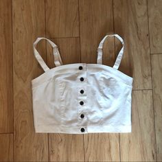 White Buttoned Crop Top From Forever 21 -Never Worn, Excellent Condition -Size Medium, But Can Fit A Size Small Too -White Fabric W/ Brown Button Closure -Can Ship Asap (1-2 Days) -Adjustable Straps Can Sell For Cheaper Shipping Price On D3p0p :) Message Me Similar To Brand Melville Urban Outfitters Pacsun John Galt White Summer Crop Top For Everyday, White Everyday Crop Top For Summer, White Crop Top Tank For Day Out, Chic White Everyday Crop Top, Chic White Crop Top For Everyday, Forever 21 Cotton Crop Top Tank Top, Forever 21 White Spring Tank Top, Forever 21 White Summer Crop Top, Forever 21 White Tank Top For Spring