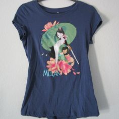 A Gently Used Disney Mulan T-Shirt. Size Is Large: Approx. Measurements: Armpit To Armpit 16" Length 24" (See Images) No Damages You Are Purchasing The One In The Images. Please Ask Questions Before Buying. Thank You. I Go Hunting To Amazing Thrift Shops To Bring You Great Shirts; Some Of Them Are Brand New Others Gently Used. I Try My Best To Check For Spots Or Other Damages But I Can Overseen Some Of Them. Thank You So Much For Looking At My Shirts. Disney Character Print Cotton T-shirt, Disney T-shirt With Front Print, Disney Trips Character Print Short Sleeve Tops, Disney T-shirt With Front Print For Fan Events, Cotton T-shirt With Character Print For Disney Events, Blue Disney T-shirt For Disney Trips, Disney Cotton T-shirt For Disney Fan Events, Disney Blue Pre-shrunk Tops, Cotton T-shirt With Character Print For Disney Trips