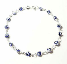 Evil eye bracelet 925 Sterling silver amulet Lampwork Blue glass eye beads Murano Greek mati Chain & link bracelet Silver Greek jewelry Good luck jewelry Evil eye protection jewelry Baptism Baby Shower Jewelry Anniversary Gift Layering bracelet Dimensions: About 18 cm  or 7.09 inches long Evil eye diameter 0.5 cm Chain Link Bracelet Silver, Baby Shower Jewelry, Protection Jewelry, Greek Jewelry, Eye Bracelet, Layered Bracelets, Cute Bracelets, Evil Eye Bracelet, Selling Jewelry