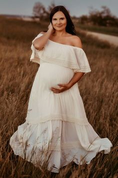 Stay comfortable and chic throughout your pregnancy with our gorgeous boho dress. . . #BohoPregnancy #BohoMaternity #BohoBump #PregnancyStyle #MaternityFashion #BohoChic #PregnancyDress #MaternityDress #BohoMama #PregnancyInspiration White Maternity Dress For Summer Wedding, White Summer Maternity Dress For Wedding, Fitted White Maternity Dress For Baptism, White Nursing Friendly Dress, White Maternity Wedding Dress For Summer, Summer White Nursing Friendly Dress, White Summer Dresses Nursing Friendly, White Maternity Dress For Spring, Flowy White Maternity Dress For Wedding