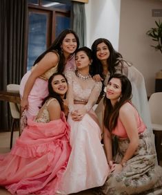 a group of women posing for a photo together