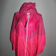 Nike Sportswear Windrunner Full Zip Jacket Coat Pink One Size Ct0870-698 Nwt Long Sleeve Outerwear For Running In Fall, Long Sleeve Fall Running Outerwear, Spring Sportswear Windbreaker With Drawstring Hood, Winter Nylon Windbreaker For Running, Winter Running Nylon Windbreaker, Hooded Nylon Running Outerwear, Hooded Nylon Outerwear For Running, Functional Fall Windbreaker For Running, Functional Fall Running Windbreaker