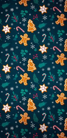 a blue background with ginger cookies and candy canes