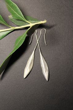 ***Olive leaf. A symbol of purity, victory peace. An eternal symbol of mother nature, of pure feelings and intentions. For those of you that seek Minimalist Leaf-shaped Sterling Silver Earrings, Minimalist Sterling Silver Leaf-shaped Earrings, Symbol Of Mother, Hammered Metal Jewelry, Sci Fi Jewelry, Eternal Symbol, Sterling Silver Earrings Handmade, Dove Necklace, Leaves Earrings