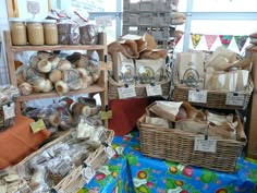 breads and other foods are on display in baskets