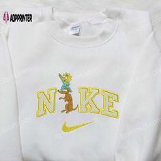 The Nike x Maggy and Dog Embroidered Shirt is a unique collaboration between Nike and renowned artist Maggy, featuring a The Simpsons Birthday, Kevin Minion, Nike Cartoon, Princess Hoodie, Nike Inspired, Crewneck Embroidery, Sneaker Heads, Cute Nike Outfits, Mickey Mouse Sweatshirt