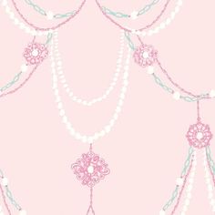 a pink wallpaper with beads and flowers on it