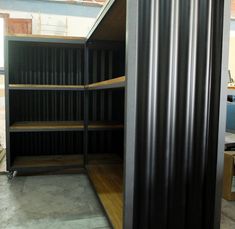 an empty storage room with shelves and other items