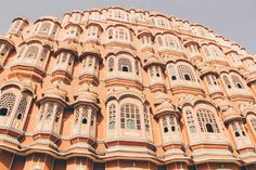 an ornate building with many windows and balconies