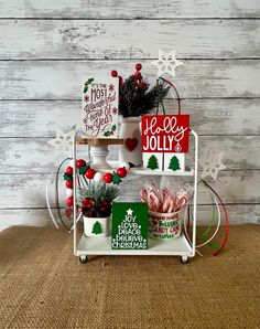 a shelf with christmas decorations on it