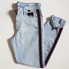 A Light Wash Pair Of Skinny Jeans With A Navy Blue, Red & White Stripe Down Each Side Leg Also Along Back Pocket (Only Right Side). Has A Great Deal Of Stretch, Low-Rise Fit & Ankle Cut With 3 Snaps On Each Side Of The Ankle Bottoms.. Bnwot Tommy Hilfiger Casual Jeans For Spring, Tommy Hilfiger Denim Bottoms For Spring, Striped Denim Bottoms With Five Pockets, Jeans With Side Stripe, Side Stripe Jeans, Denim Jeans With Vertical Stripes, Casual Mid-rise Bottoms By Tommy Hilfiger, Tommy Hilfiger Blue Straight Leg Bottoms, Tommy Hilfiger Blue Denim Bottoms