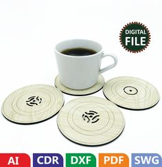 four coasters with different designs on them and a cup of coffee in the middle