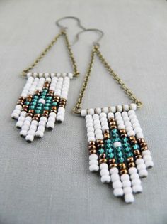 white and green beaded earrings with gold chains